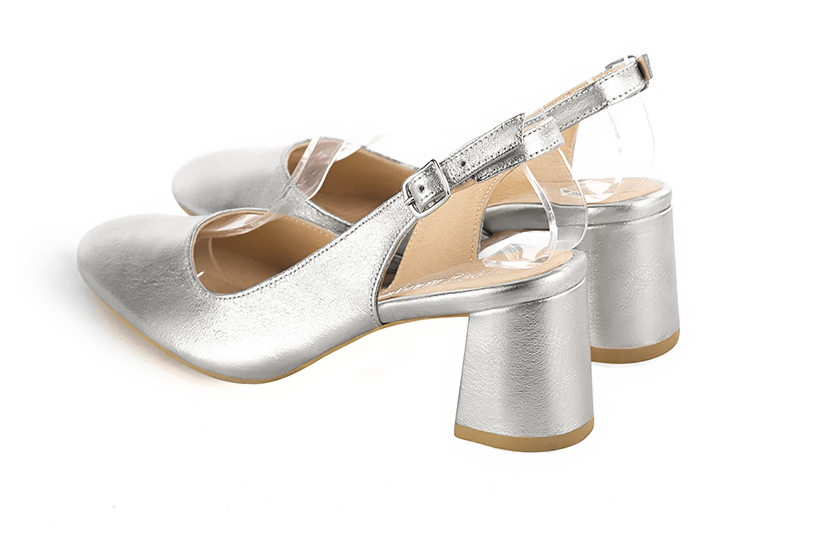 Light silver women's slingback shoes. Round toe. Medium flare heels. Rear view - Florence KOOIJMAN